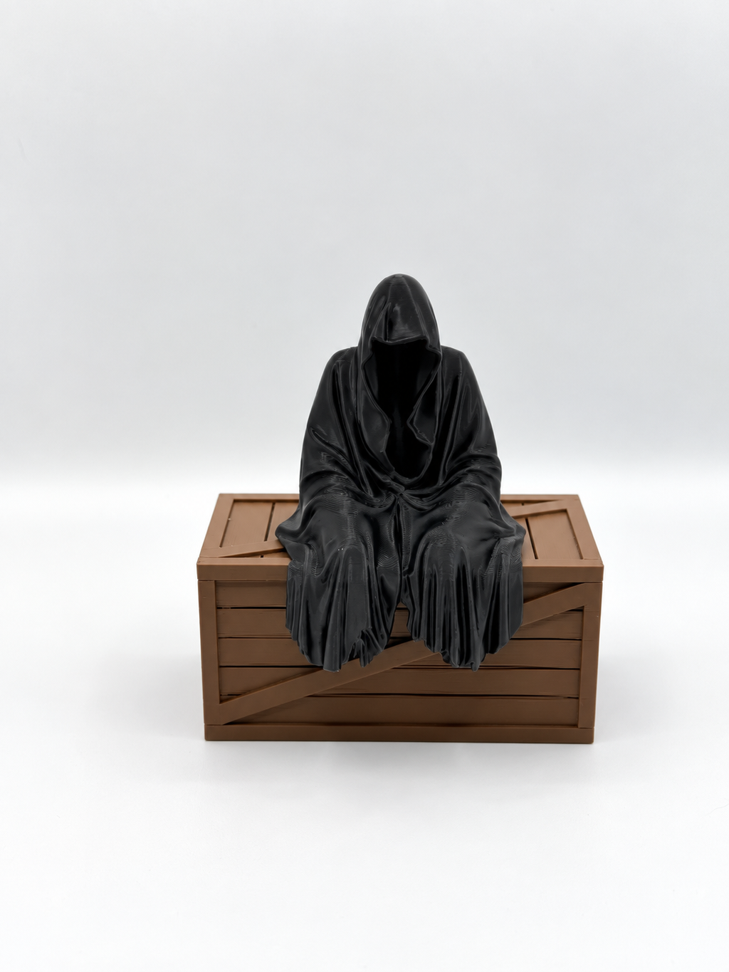 Grim Reaper Figurine – Seated Dark Decor with Wooden Crate