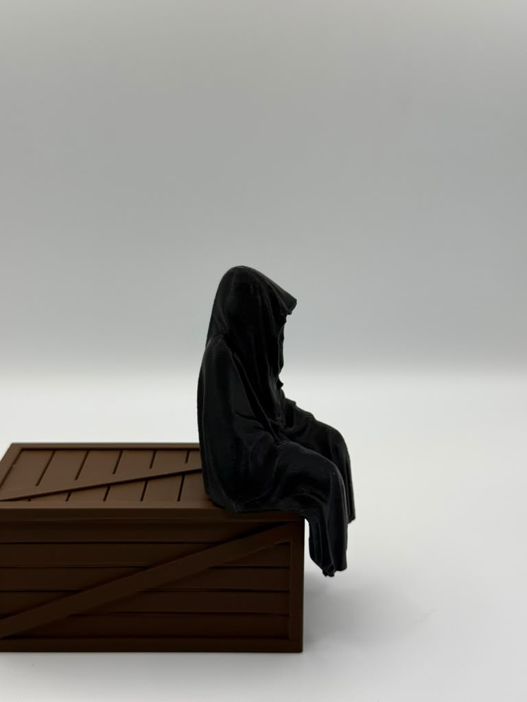 Grim Reaper Figurine – Seated Dark Decor with Wooden Crate